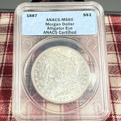 1887-P $1 Morgan Dollar VAM-12A Alligator Eye Top-100 Error ANACS MS 60 SP5840 - Image 1 of 3