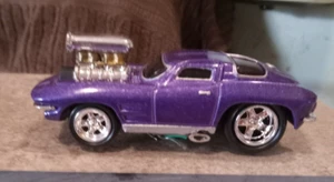 MUSCLE MACHINE. 1:63. LOOSE. 1963 CORVETTE. PURPLE.. - Picture 1 of 1