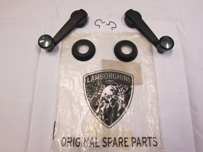 Lamborghini Countach LP400 viuda bobinadora puerta manivela par original + biseles abrazaderas Foto 1 de 4