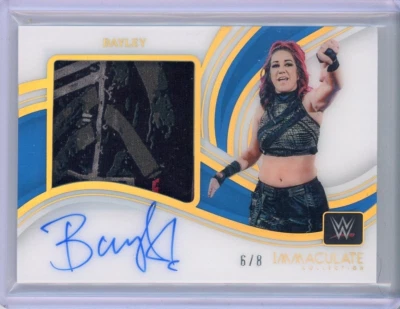 2023 Immaculate WWE Bayley Premium Memorabilia Acetate Auto Patch #6/8 - Image 1 of 2