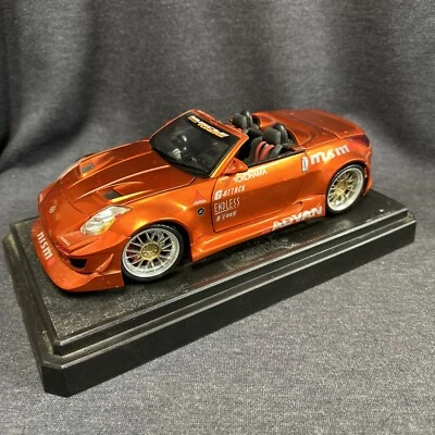 Muscle  Machine NISSAN Convertible 1/18 scale diecast ORANGE Nism Advan - Image 1 of 4