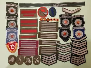 40 insignias textiles de la RDA MdI KG NVA policía popular Trapo - Imagen 1 de 6
