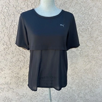 Camiseta deportiva Puma para mujer con panel de malla negra manga corta mediana Foto 1 de 4