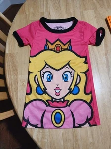 Super Nintendo World Princess Peach Shirt, Size XXS, Pre-owned But Excellent... - Picture 1 of 3