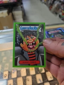2024 Topps GPK Green Day Garbage Pail Kids Green Parallel Tooth Les 18b - Picture 1 of 2