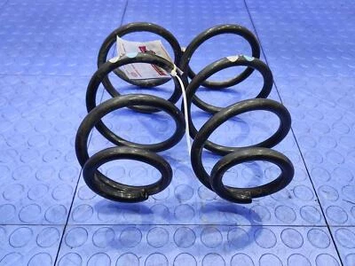 Juego de dos muelles helicoidales de suspensión trasera Nissan Versa Note 14-16 OEM 550203VY1B Foto 1 de 4