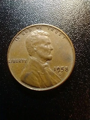 D Penny Error 1958. Anverso 8 parcialmente lleno Foto 1 de 3
