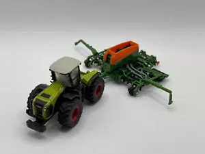 Siku Farmer Claas Xerion mit Sämaschine Amazone Cayenna 6001 1826 - Bild 1 von 3