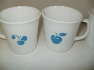 Juego de 4 tazas Corning Ware Eve azul manzana y cereza - Usado en excelente estado - Imagen 1 de 4