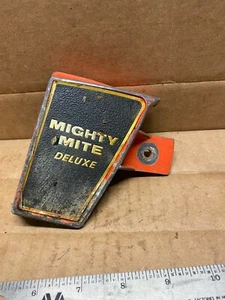 A used clutch cover from a Remington Mighty Mite Deluxe Chainsaw - Picture 1 of 4