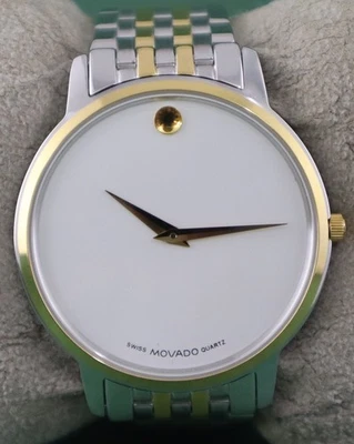 Reloj de lujo MOVADO de cuarzo esfera blanca excelente funcionamiento para hombre correa de acero inoxidable Foto 1 de 4