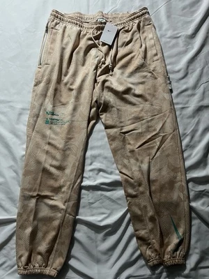 Pantalones de baloncesto Nike Dri-FIT edición estándar beige floral para hombre talla 2XL NUEVOS Foto 1 de 4