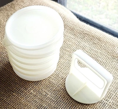 Vintage Tupperware 7pc Hamburger Press Keepers 4.5" - Image 1 of 4