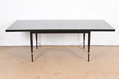 Mesa de comedor Paul McCobb para extensión direccional de laca negra y latón Foto 1 de 4