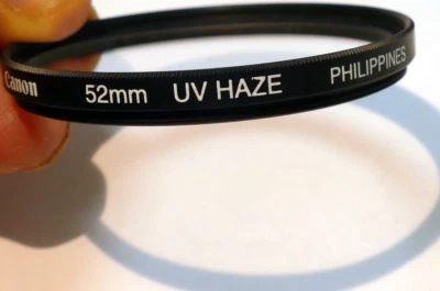 Canon 52mm Filter UV Haze  50mm f1.4 nFD - EOM Original - Image 1 of 4