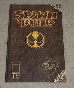 SPAWN BIBLIA CÓMIC #1 FIRMADO - Imagen 1 de 3