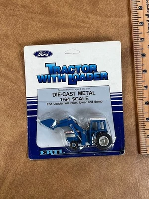 1986 Ertl Ford TW-35 Tractor w/Front End Loader #828 New 1/64 - Image 1 of 4