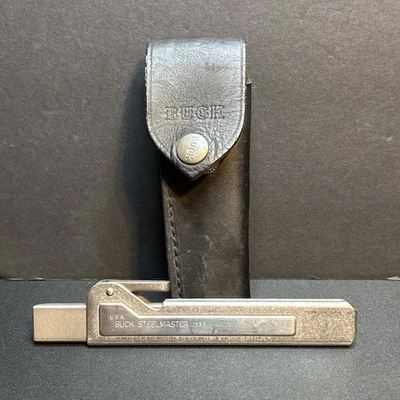 Faca Buck 137 Steelmaster afiador vintage EUA pedra de aço com bainha de couro - Imagem 1 de 4