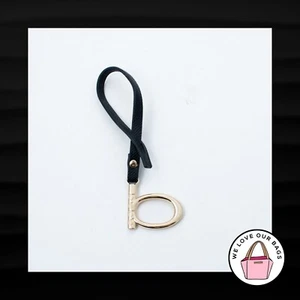 NEW BEBE B GOLD BRASS METAL BLACK LEATHER LOOP STRAP FOB BAG CHARM KEYCHAIN TAG - Picture 1 of 2