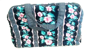 Estuche de Viaje Plegable Floral para Cuna 11.5x8" Plegado Multi Compts Vinilo Línea Dble Snap - Imagen 1 de 4