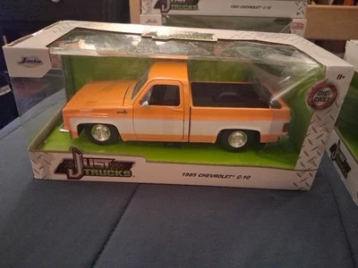 JADA Just Trucks 1/24 1985 Chevy C-10 Pickup Stock (naranja/blanco) Foto 1 de 4