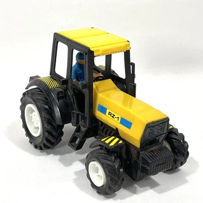 Vintage New Ray RZ-1 Push Yellow Tractor 5" - Image 1 of 4
