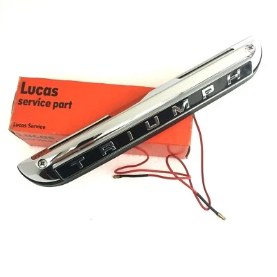 718028 - LUCAS L766 NUMBER PLATE LAMP & TRIUMPH BADGE LUCAS 54866 STAG,GT6,SPIT - Image 1 of 4