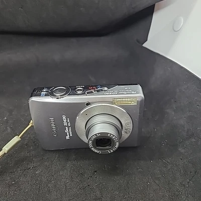 Цифровая камера Canon PowerShot SD630 6,0 Мп ELPH - ПРОТЕСТИРОВАНА - без зарядного устройства #6 - Изображение 1 из 4