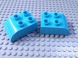 LEGO New DUPLO Lot of 2 Dark Azure 3x2 Curved Foot Bricks - Picture 1 of 1