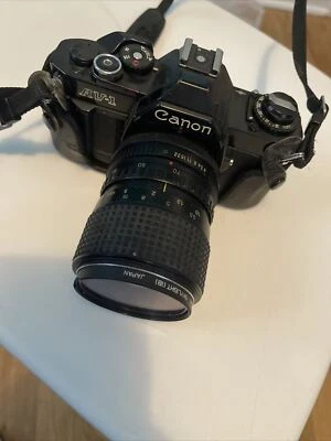 [Canon AV-1 Negro 35mm SLR con Lente 35-70mm f/4 (17) Foto 1 de 4