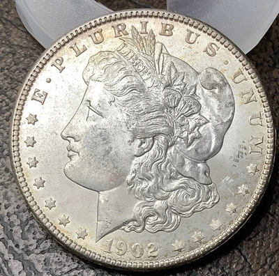 1902 年 O 版摩根银币轻色调选择未流通熔体价 = 38.50 美元带 50 美元 — 第 1/4 张图片