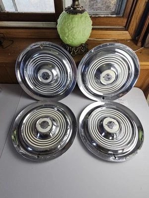 Juego de 4 cubiertas de rueda tapacubos Oldsmobile Jetstar 15" vintage 1954-1955 OEM Foto 1 de 4