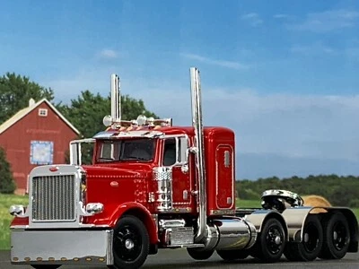 1/64 DCP RED PETERBILT 389 TRI AXLE W/ 36" SLEEPER - Image 1 of 4