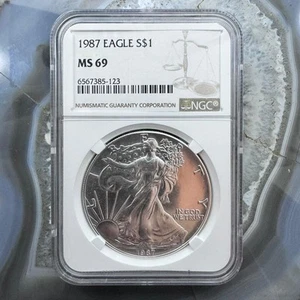 1987 US 1.0oz.999 Fine Silver American Silver Eagle NGC MS69 #6567385-123EG - Picture 1 of 6