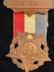 Antique F.C.L. Ladies Grand Army of the Republic 1886 medal & ribbon - Picture 1 of 5