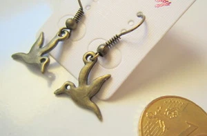 Pendientes forma gaviota lisos 32 mm baño bronce ligeros bisutería 066 - Imagen 1 de 2