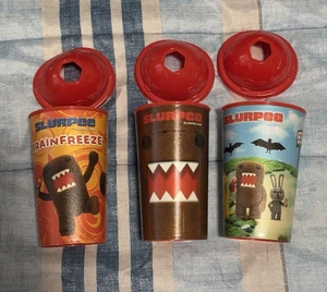 Domo Slurpee 7-Eleven Plastikbecher mit Deckel 2009 Vintage 3 Stück RAR - Bild 1 von 1