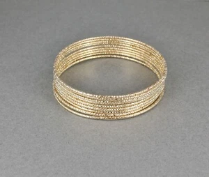 Gold tone set pack of 8 metal thin skinny bangle bracelet shiny 2 5/8" wide - Picture 1 of 5