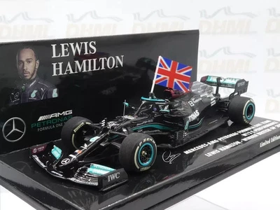 Minichamps 1:43 Lewis Hamilton Mercedes W12 Winner British GP 2021 + flag - Image 1 of 3