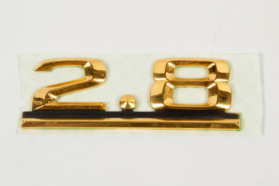 1993 Mercedes-Benz 300E Gold "2.8" Trunk Emblem 1248175115 New Genuine - Image 1 of 1