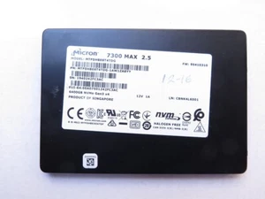 Micron 6,4 To 7300 Max PCIe 3,0 NVMe 2,5'' U.2 SSD MTFDHBE6T4TDG 9280 heures - Photo 1/2