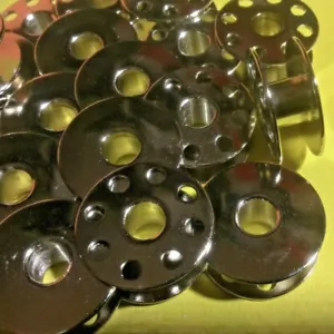 20 handelsübliche Metallspulen für Consew Nähmaschine Industrie viele Modelle - Bild 1 von 3