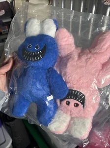 Blue & Pink Plush Bunny Toys With Grinning Faces - Picture 1 of 5