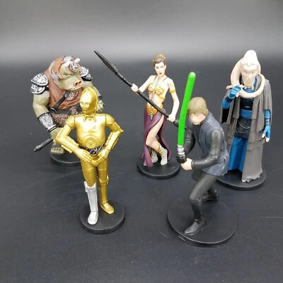 Disney Store Guerra de las Galaxias Princesa Leia Esclava/CPO3/Luke/Babero Fortuna/Guardia Gamorreana Foto 1 de 4