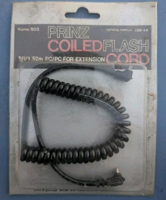 Prinz No.320-14 PC/PC flash Ext. cord 5' coiled NOS - Image 1 of 2