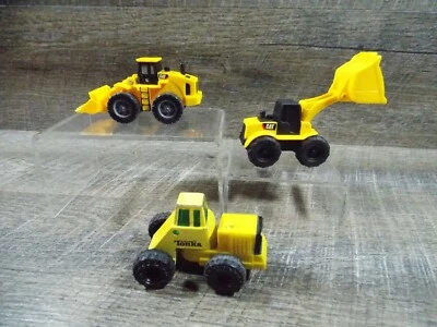 Yellow Metal & Plastic Tonka Tractor & 2 Plastic CAT Caterpillar Loaders 3 to 4" - Image 1 of 4