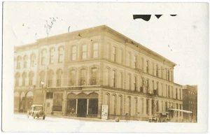 USA 1920 RPPC Postkarte, großer Laden, Bürogebäude - Bild 1 von 2