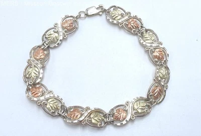 Pulseira de tênis 8" 12K vários tons ouro/prata esterlina motivo folha - 12,48 gramas - Imagem 1 de 4