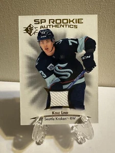 2021-22 SP - Rookie Authentics Jersey #105 Kole Lind (MEM, RC) - Bild 1 von 2