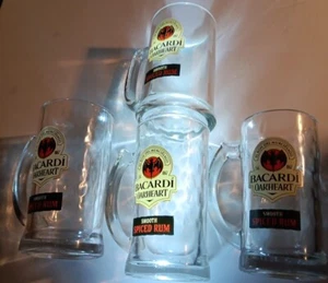 Set 4 bicchieri birra Bacardi Oakheart rum speziato fossette trasparenti Steins Bar - Foto 1 di 10